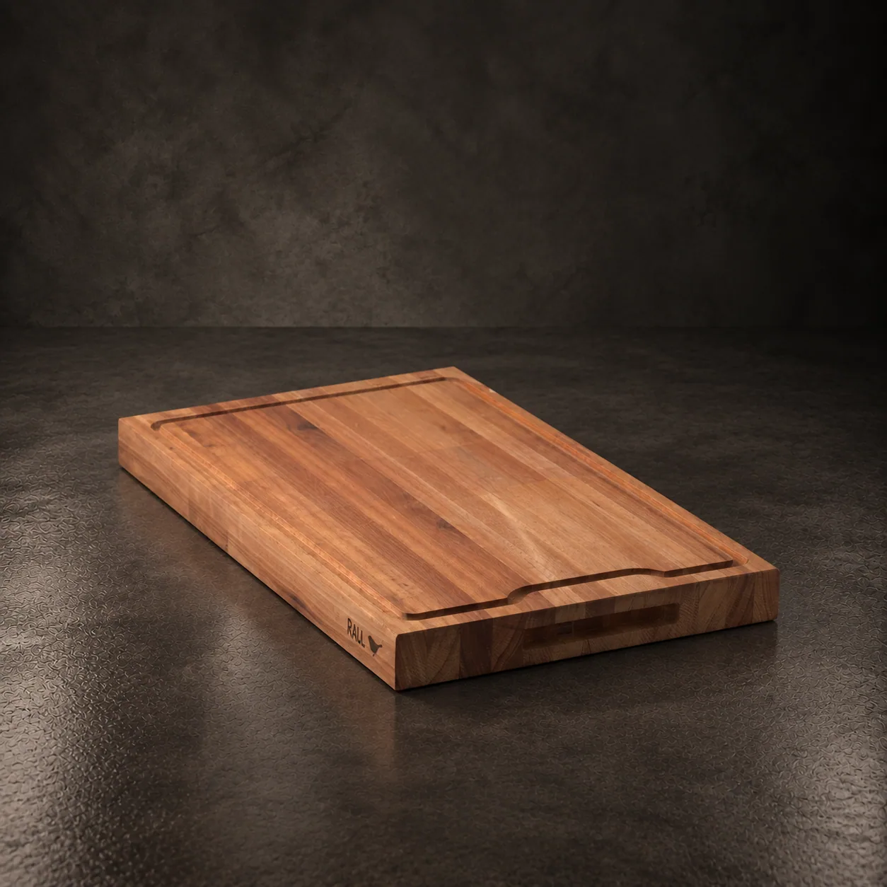 The thick Atuel cutting board, on dark stone