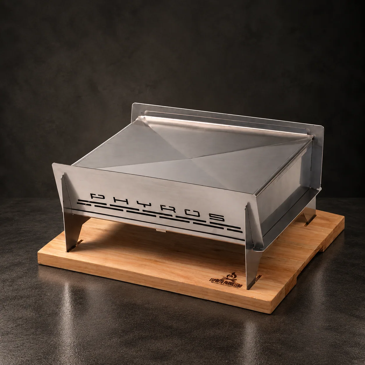 The Phyros brazier with its grill on top, on dark stone