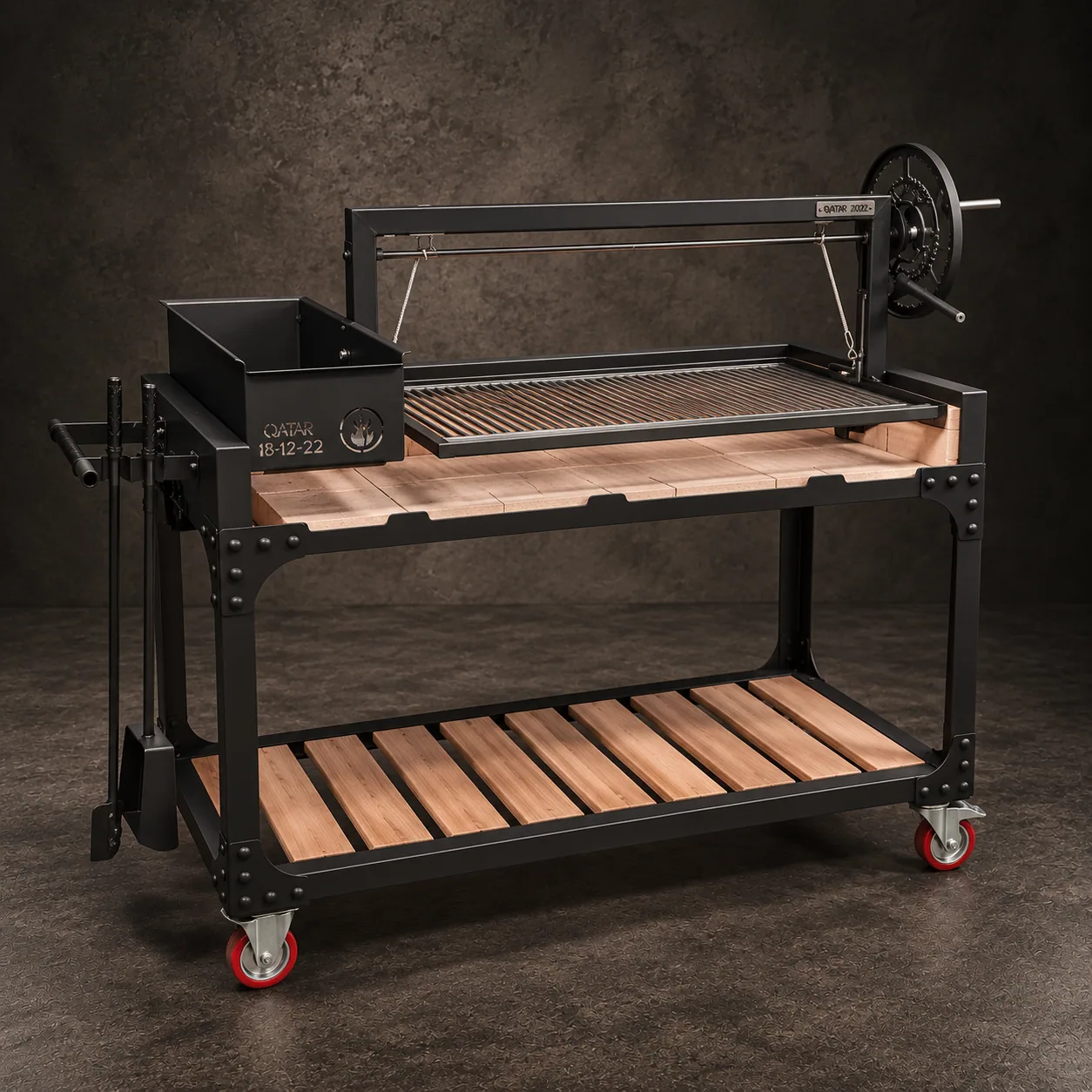 The Qatar grill with its crank-lift stainless grate, on dark stone