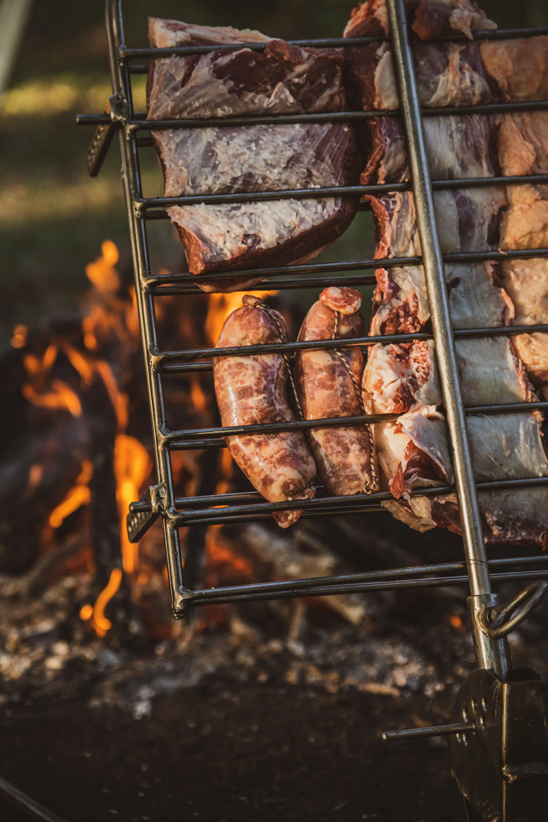 Ribs cooking on a Sostiene medium roaster